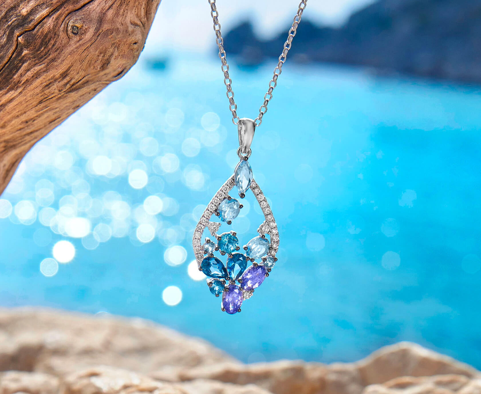 Le Vian® Pendant featuring 1 1/6 cts. Blue Topaz, 7/8 cts. Deep Sea Blue Topaz™, 7/8 cts. Blueberry Tanzanite®, 1/3 cts. Blueberry Zircon™, 1/3 cts. Nude Diamonds™ set in 14K Vanilla Gold®